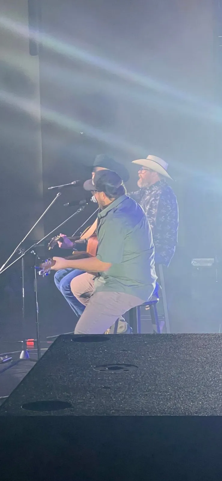 Acoustic country performers on a hazy concert stage with sound reinforcement by Phase 3 Live
