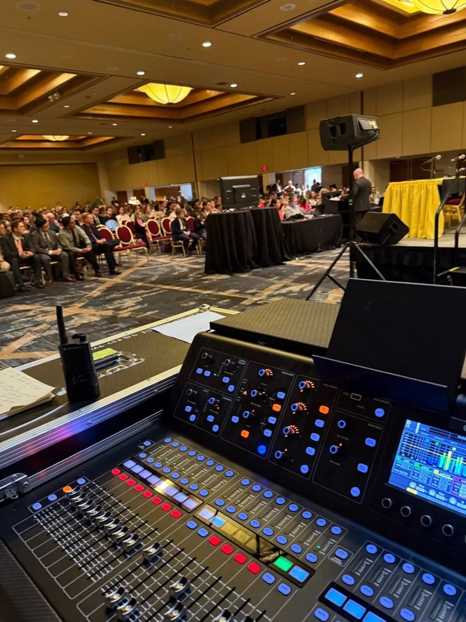 Front-of-house mixing console run by Phase 3 Live at a corporate conference in a hotel ballroom
