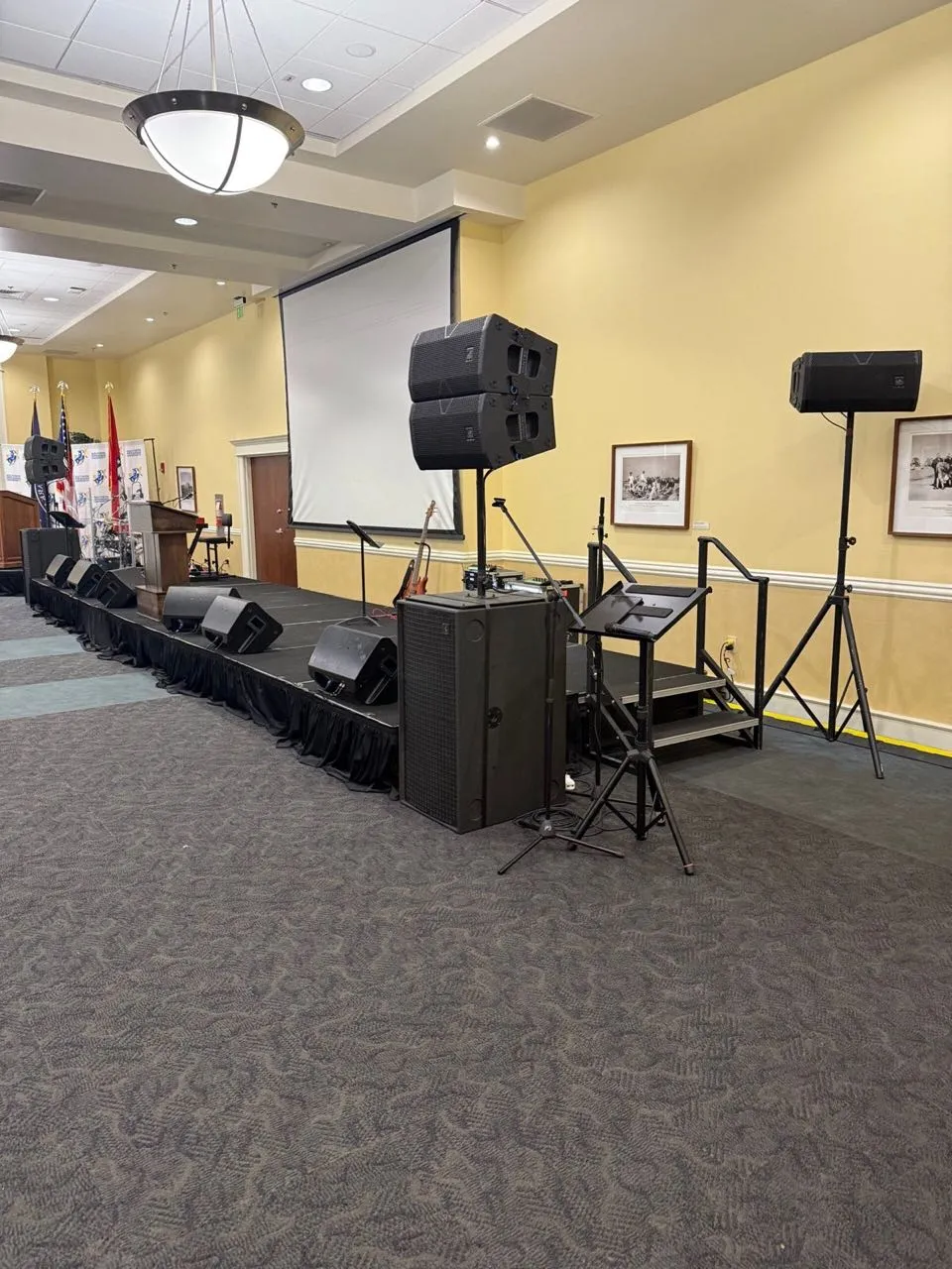 Stage, sound, and projection setup by Phase 3 Live for a ballroom event