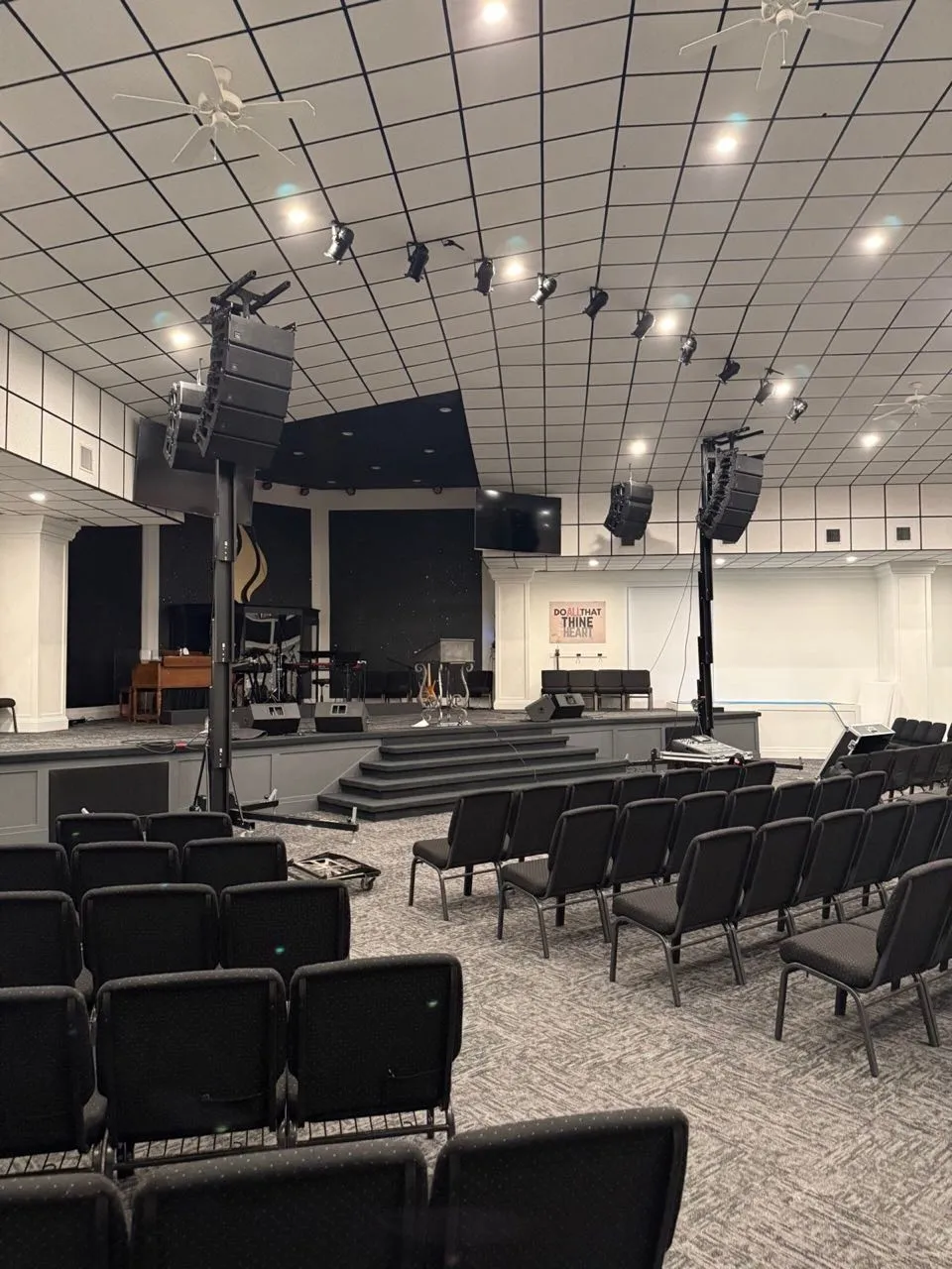 Church sanctuary with line arrays and stage lighting installed by Phase 3 Live