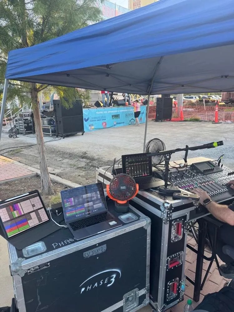 Phase 3 Live front-of-house rig with branded road case at an outdoor festival stage