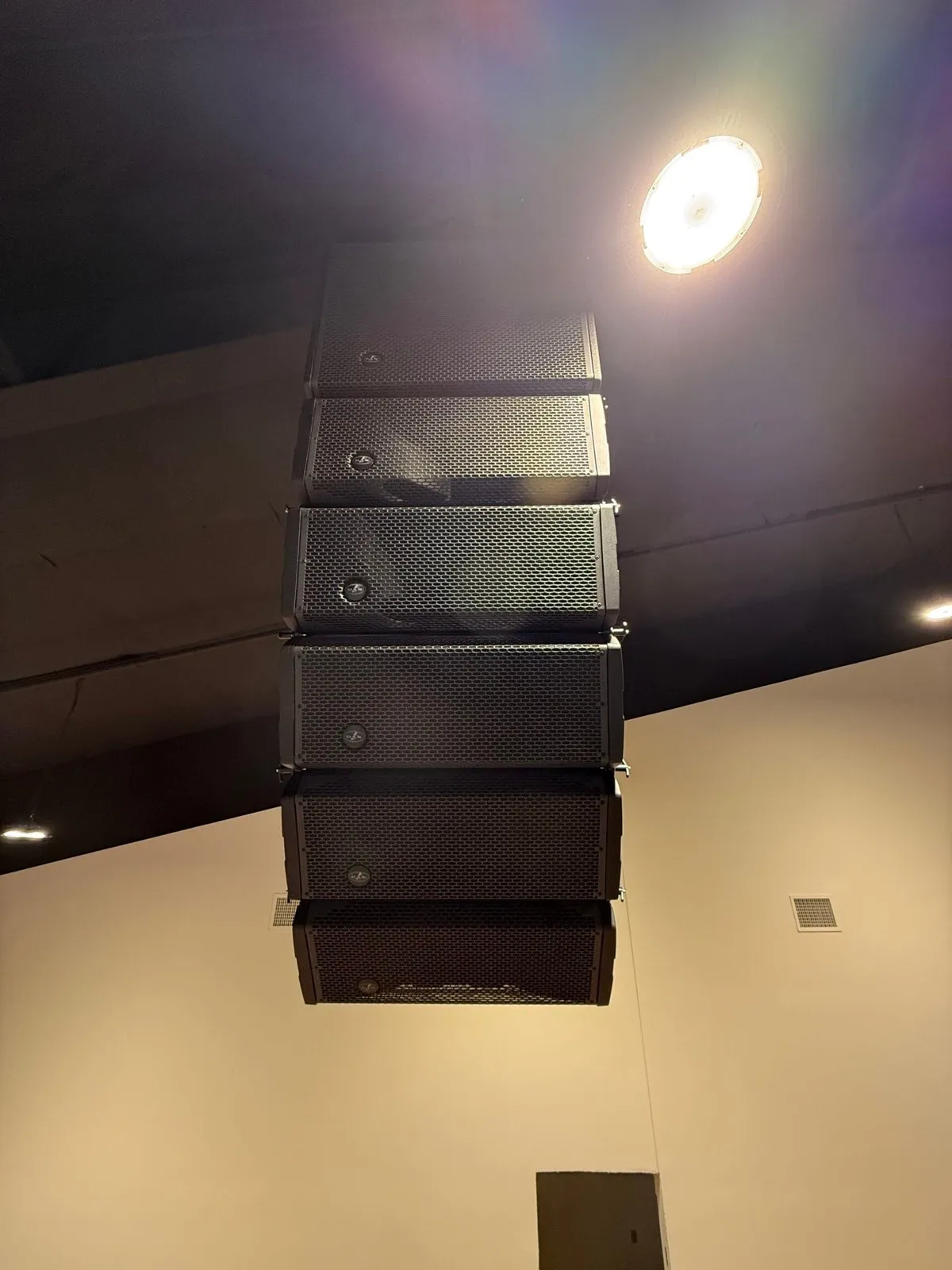 Completed line array hang installed by Phase 3 Live in an indoor venue
