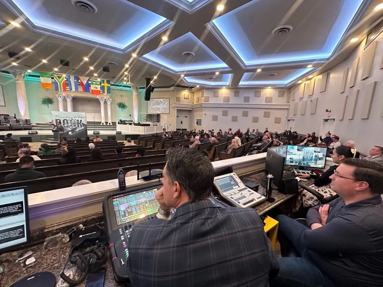 Phase 3 Live front-of-house engineers mixing audio and video during a church service