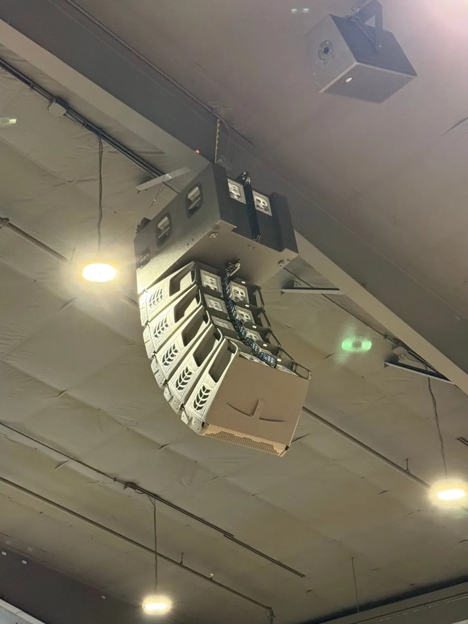 Underside of a flown line array and rigging frame installed by Phase 3 Live