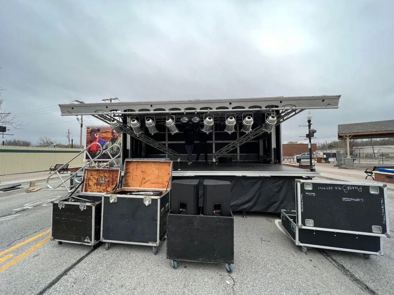Phase 3 Live mobile stage trailer deployed on a downtown street with lighting fixtures hung on truss