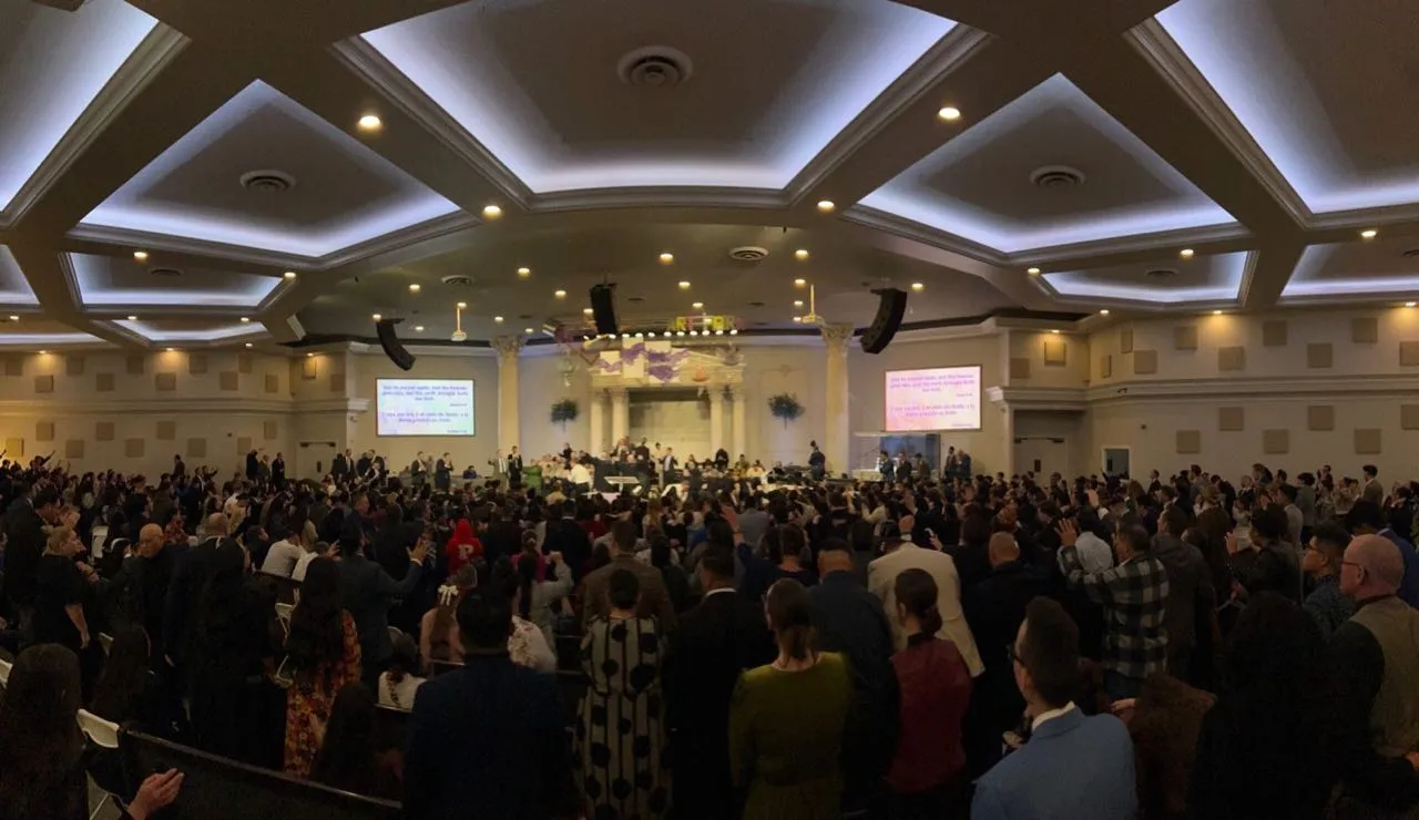 Packed church sanctuary worship service with sound and projection supported by Phase 3 Live